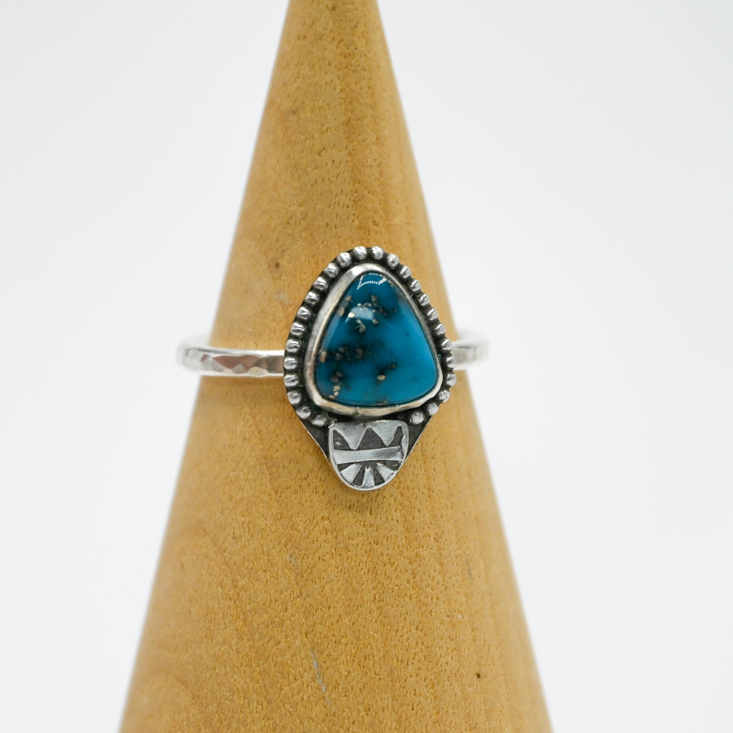 Ma'anshan turquoise with bead wire around and stamp size 8.5