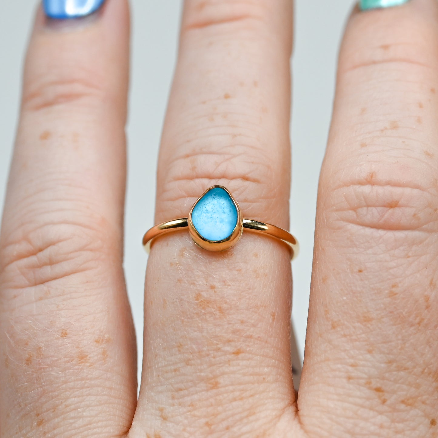 Gold fill rare bright electric blue sea glass size 7.5