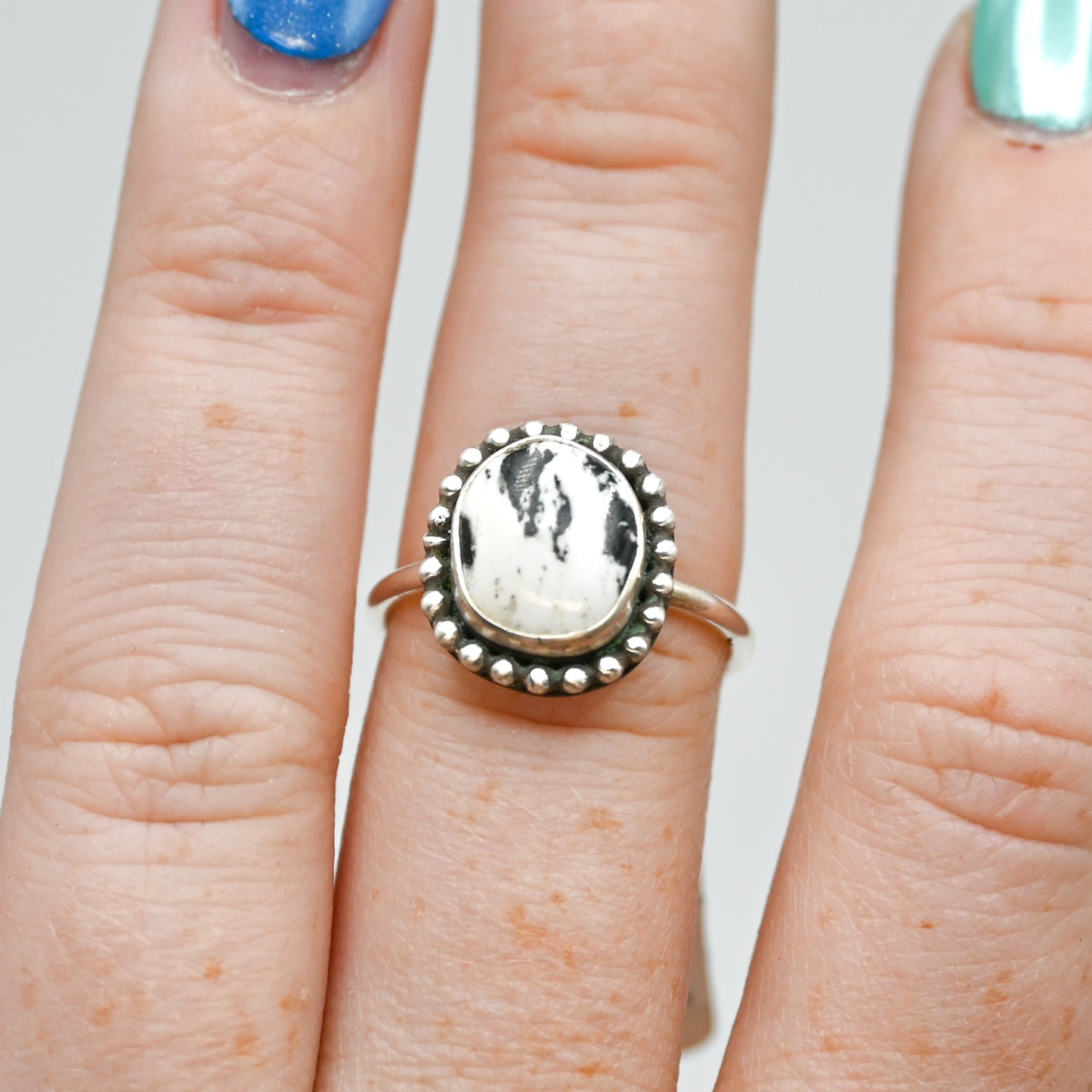 White buffalo with bead wire around size 6.75