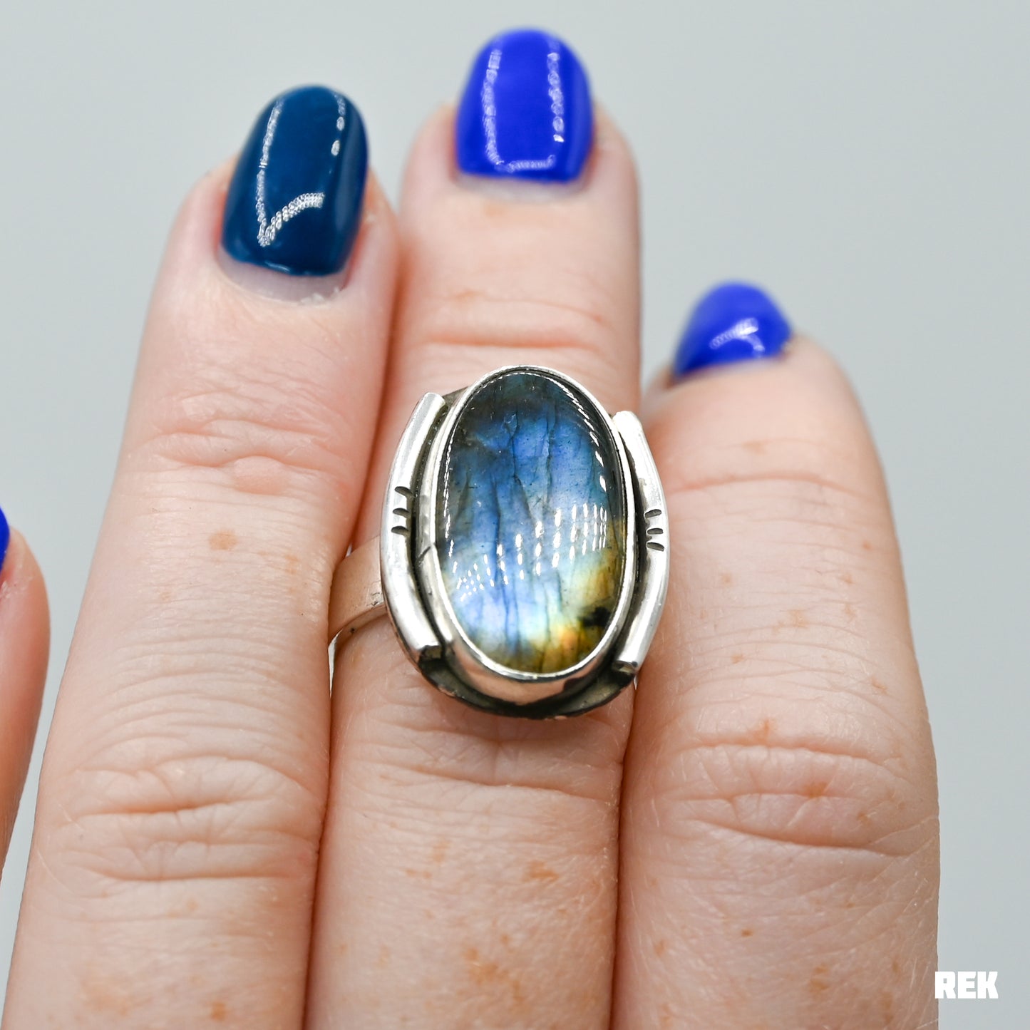 Oval labradorite with silver ornaments size 6.75