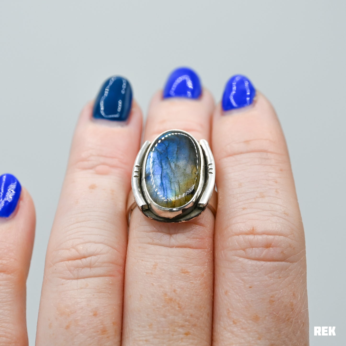 Oval labradorite with silver ornaments size 6.75