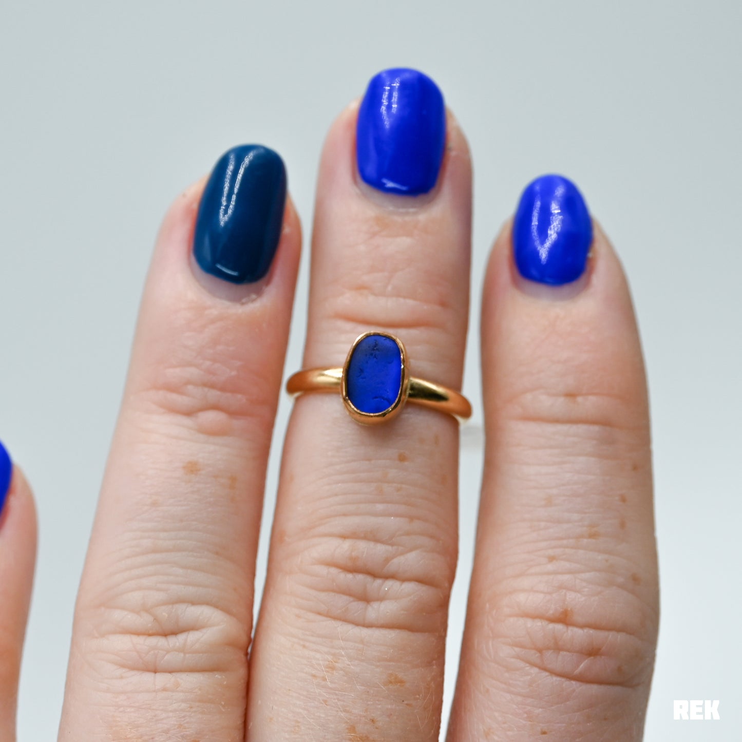 Gold fill cobalt sea glass size 5