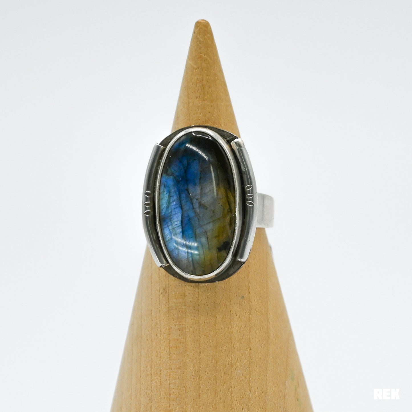 Oval labradorite with silver ornaments size 6.75
