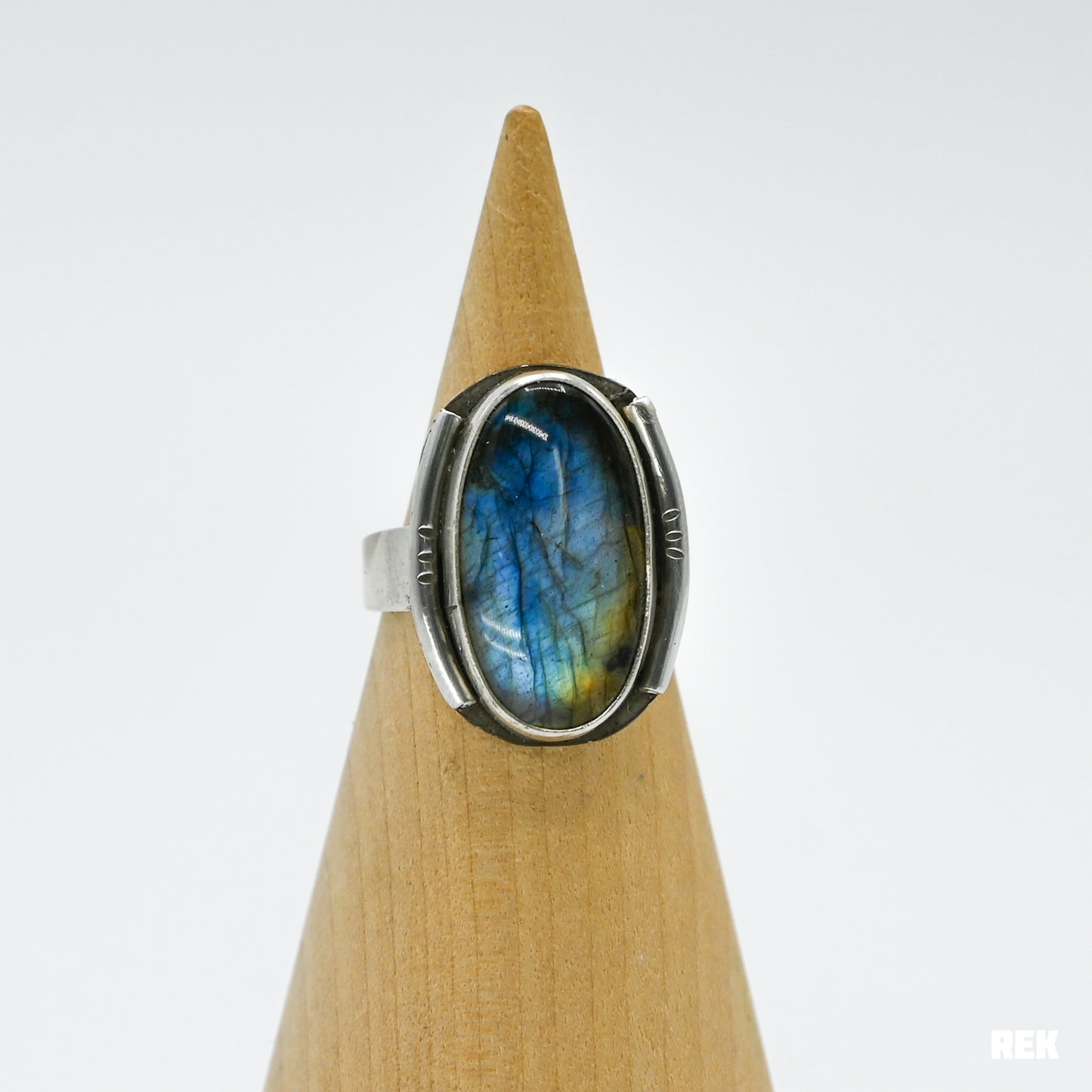 Oval labradorite with silver ornaments size 6.75