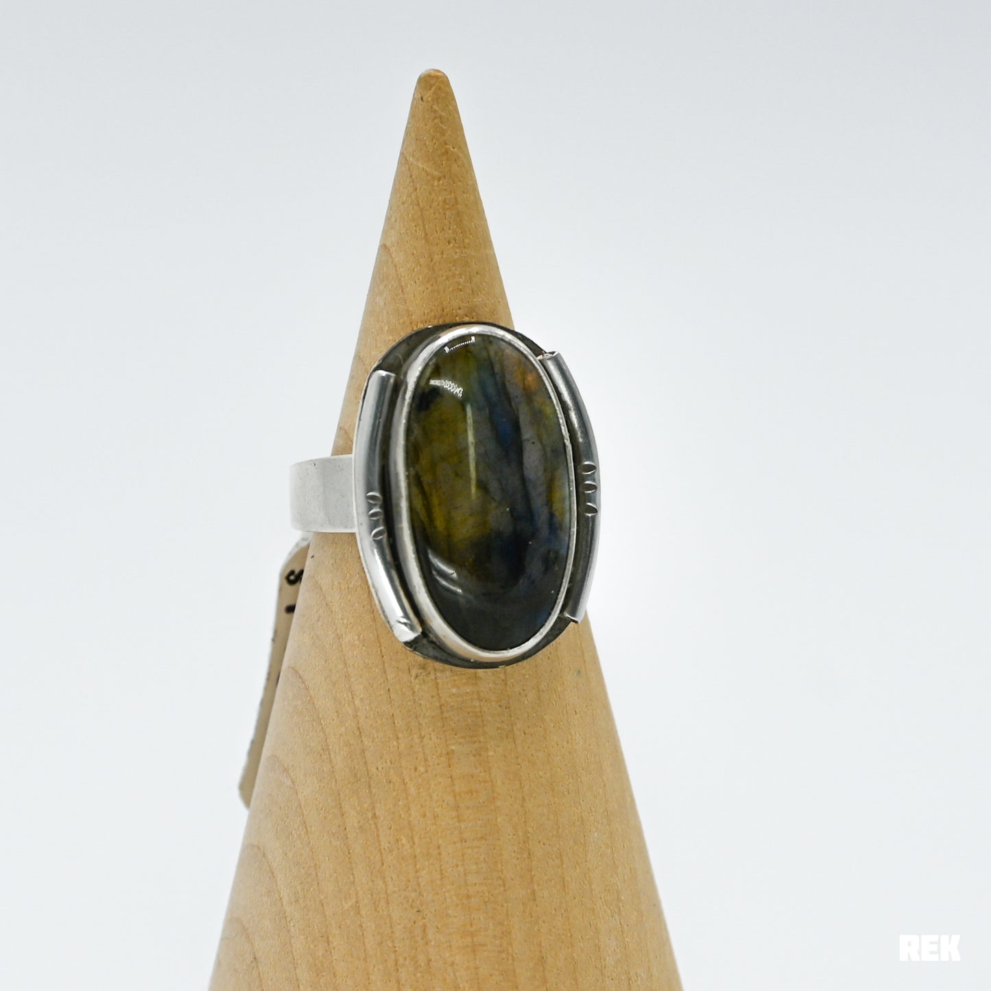 Oval labradorite with silver ornaments size 6.75
