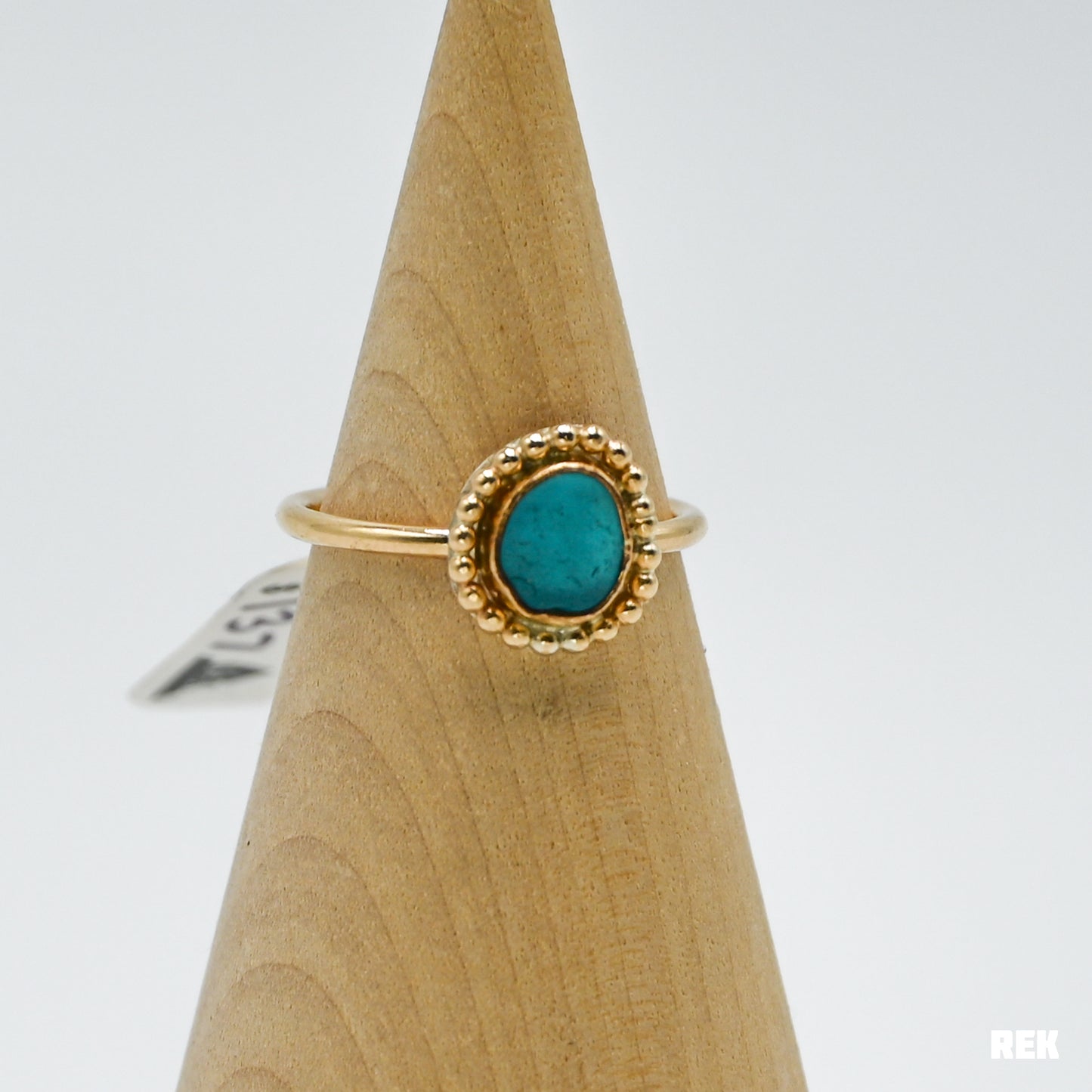 Gold fill turquoise sea glass bead around size 7.5