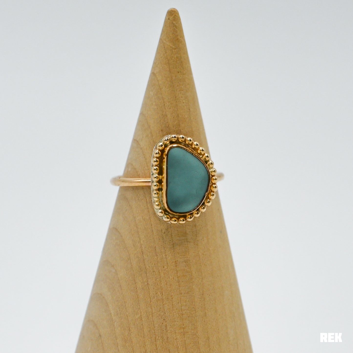 Gold fill aqua sea glass bead around size 7.5