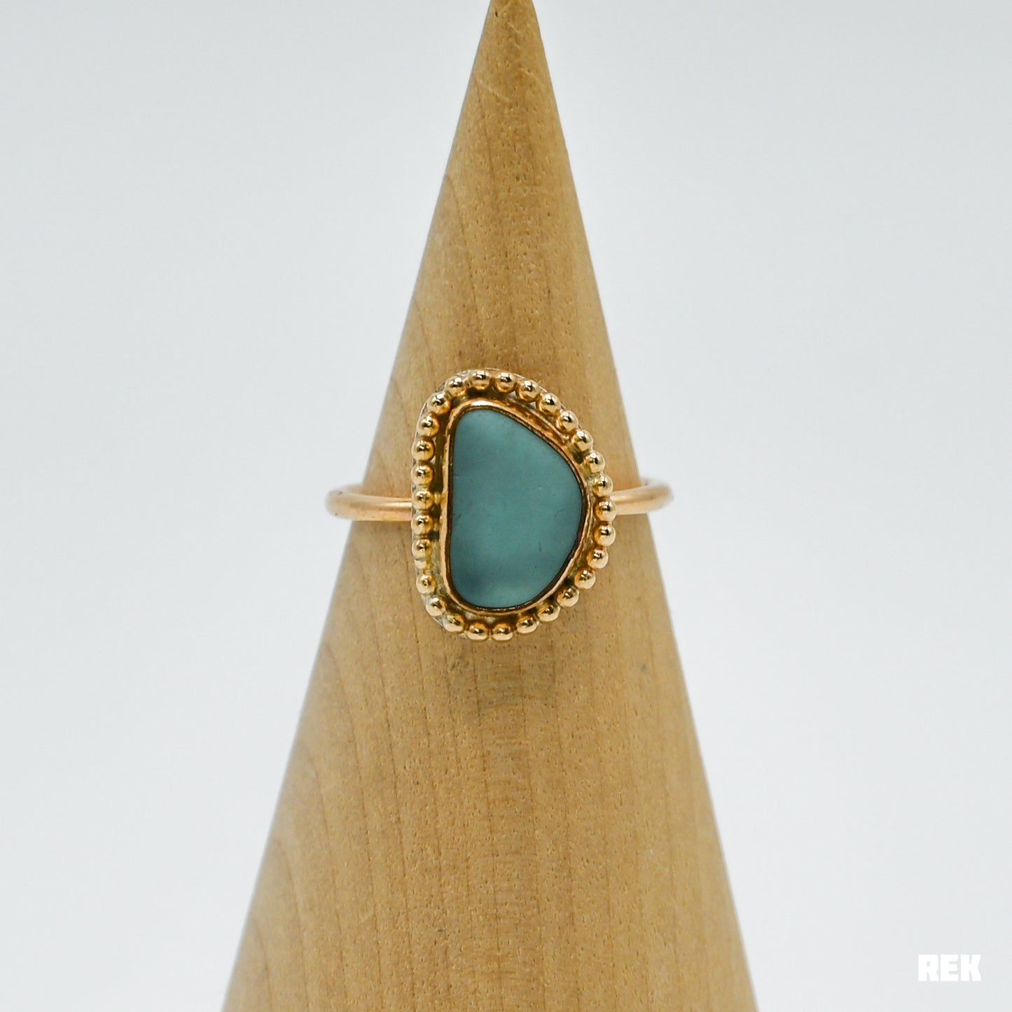 Gold fill aqua sea glass bead around size 7.5