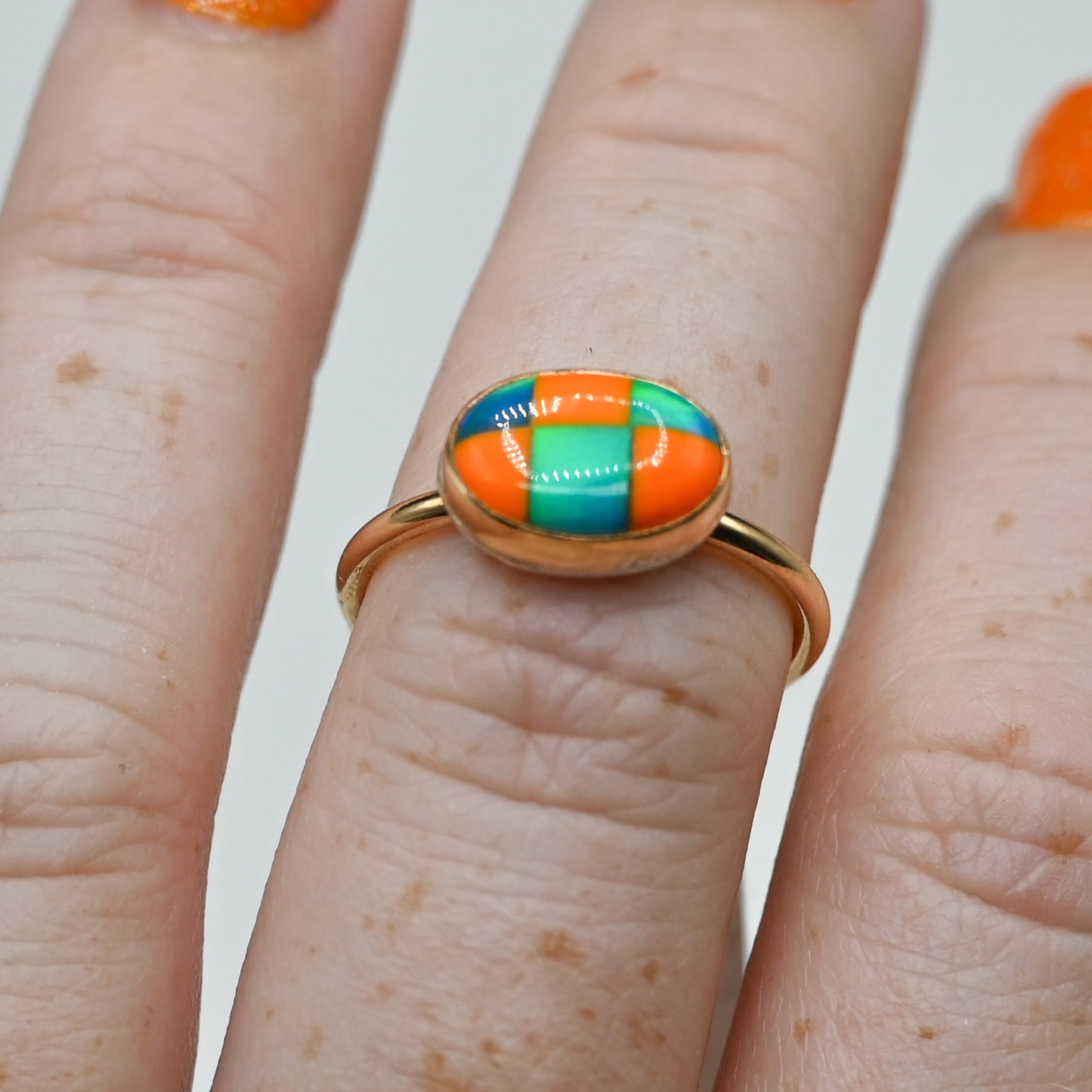 Gold fill horizontal oval checkered aurora opal size 7