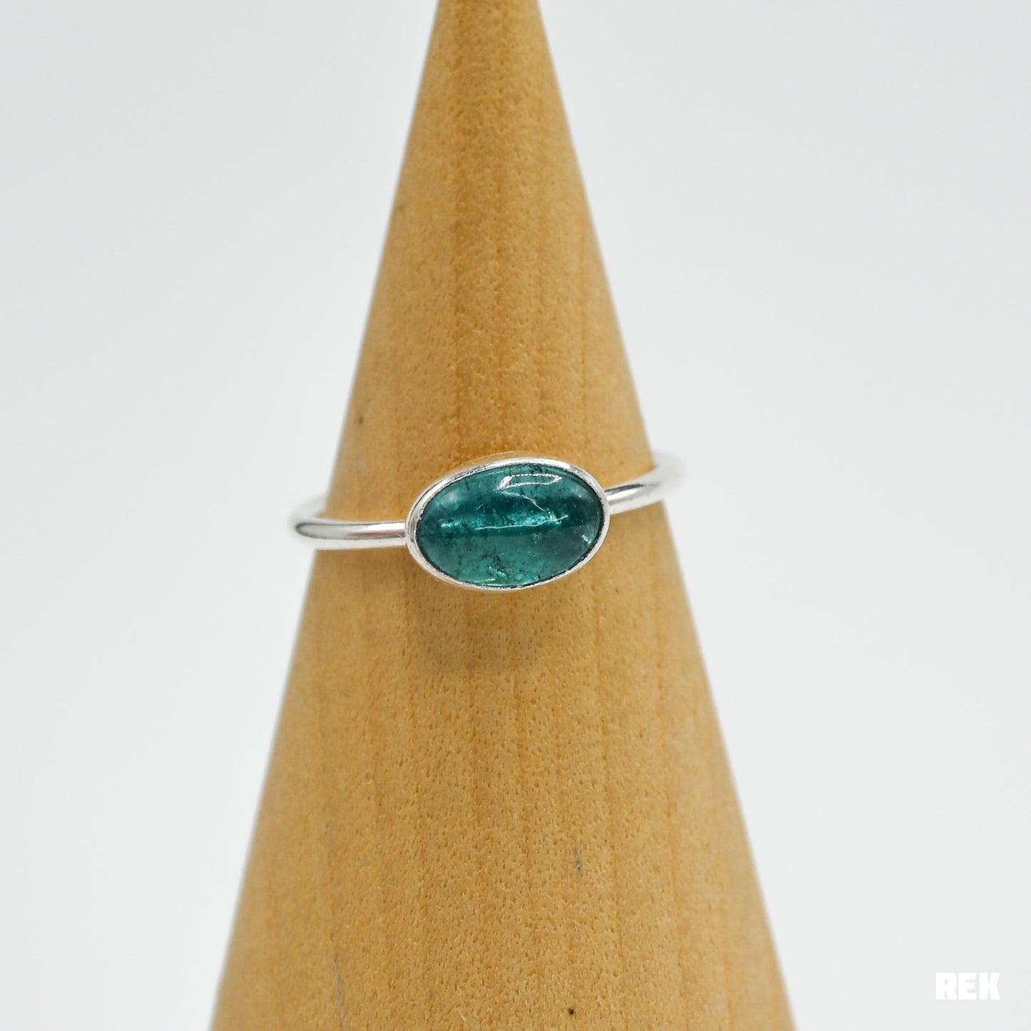 Oval horizontal bright blue tourmaline size 7