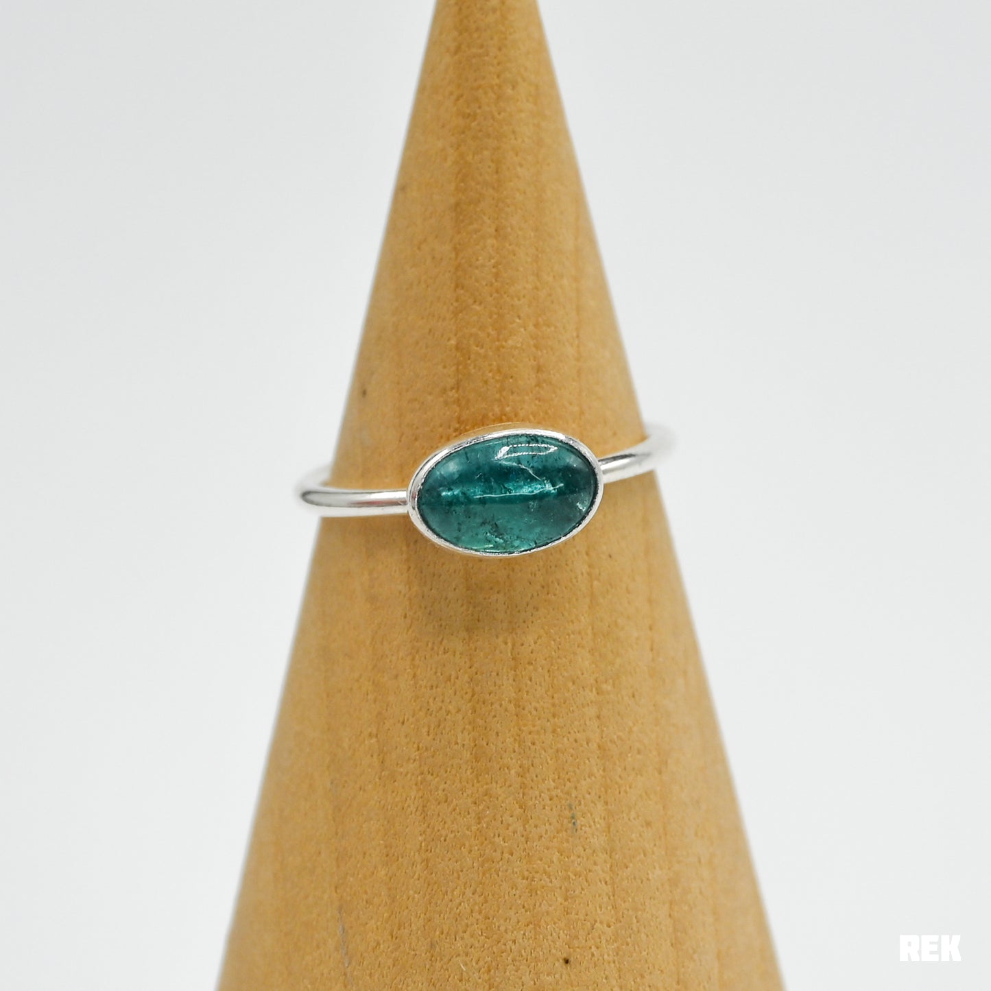 Oval horizontal bright blue tourmaline size 7