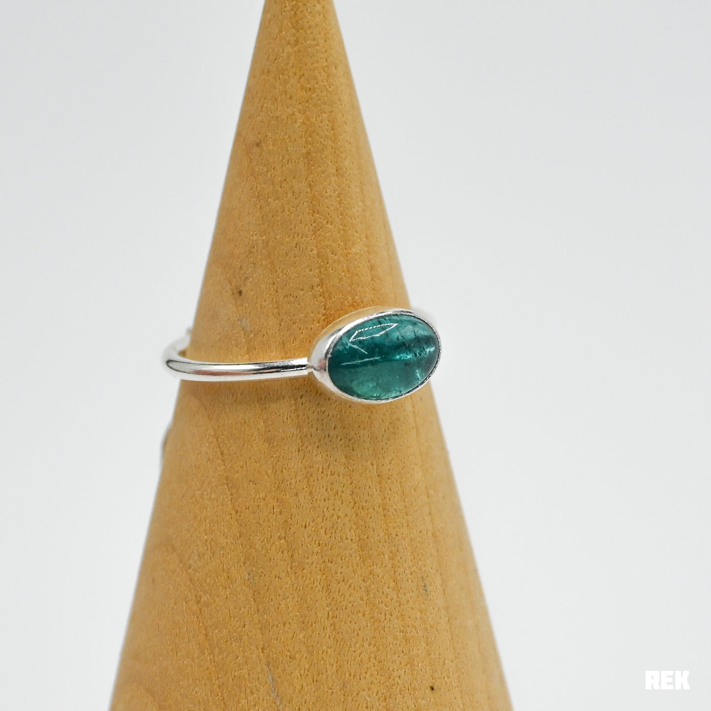 Oval horizontal bright blue tourmaline size 7