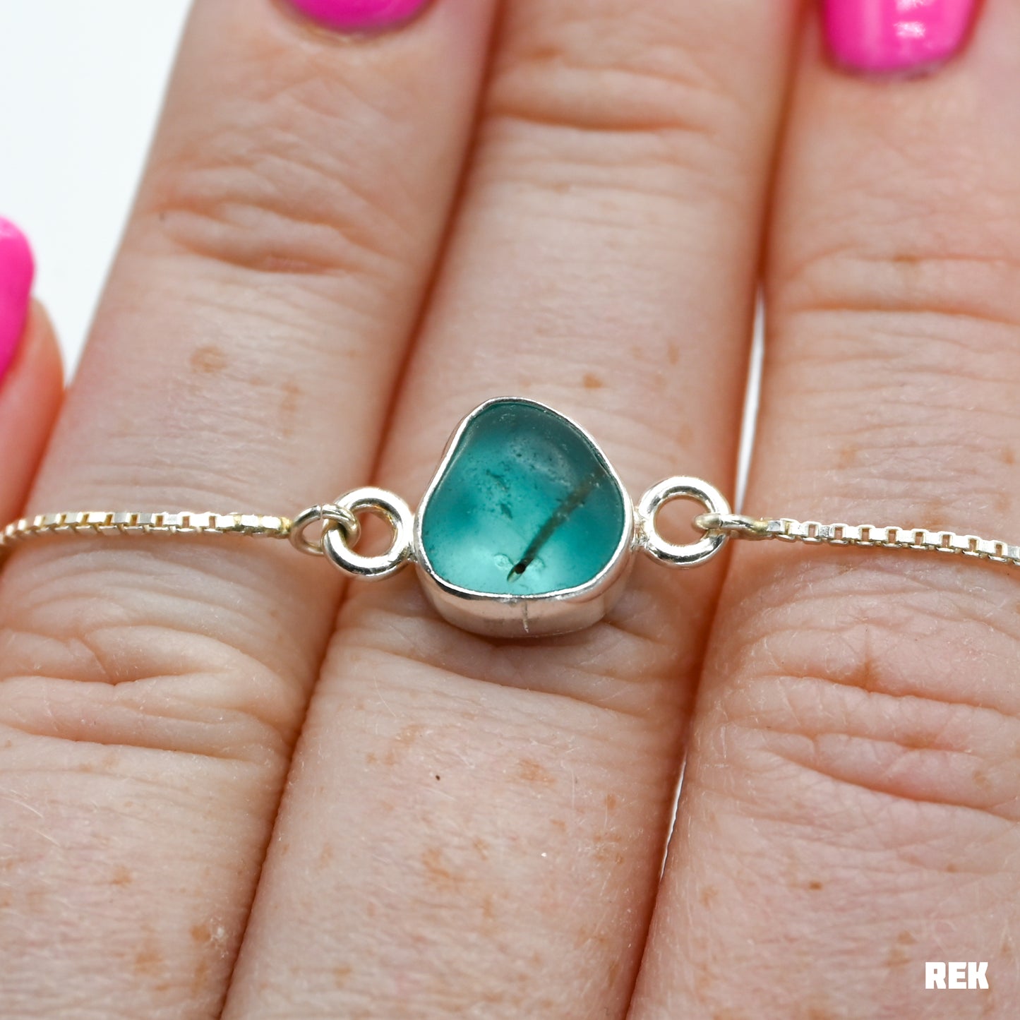 Adjustable bracelet with bright aqua safety sea glass