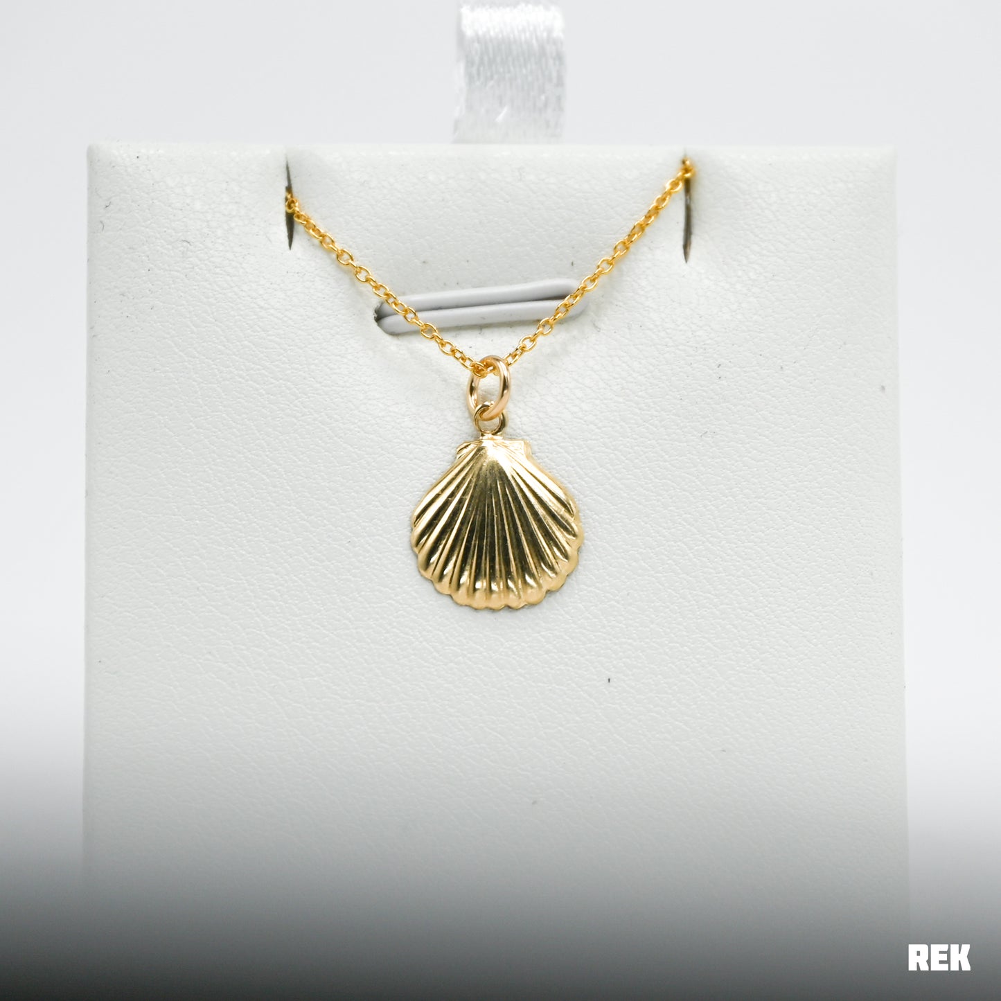 Gold fill shell charm necklace