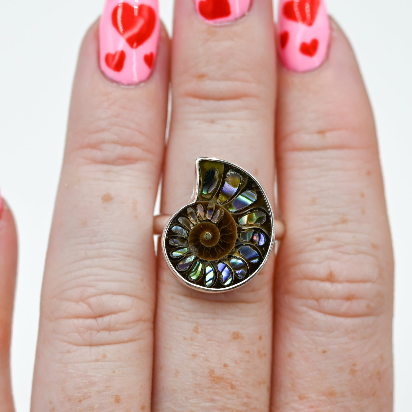 Ammonite with abalone inlay size 7