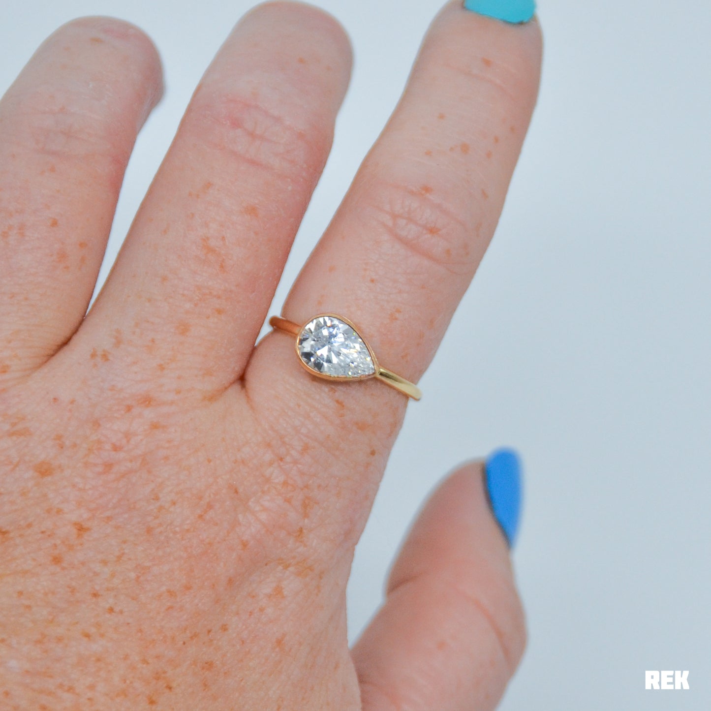 Gold fill horizontal faceted CZ pear size 8