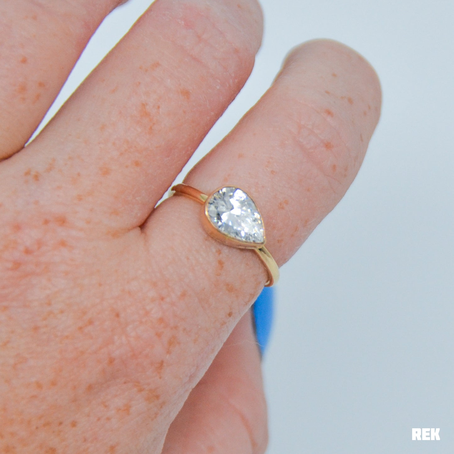 Gold fill horizontal faceted CZ pear size 8