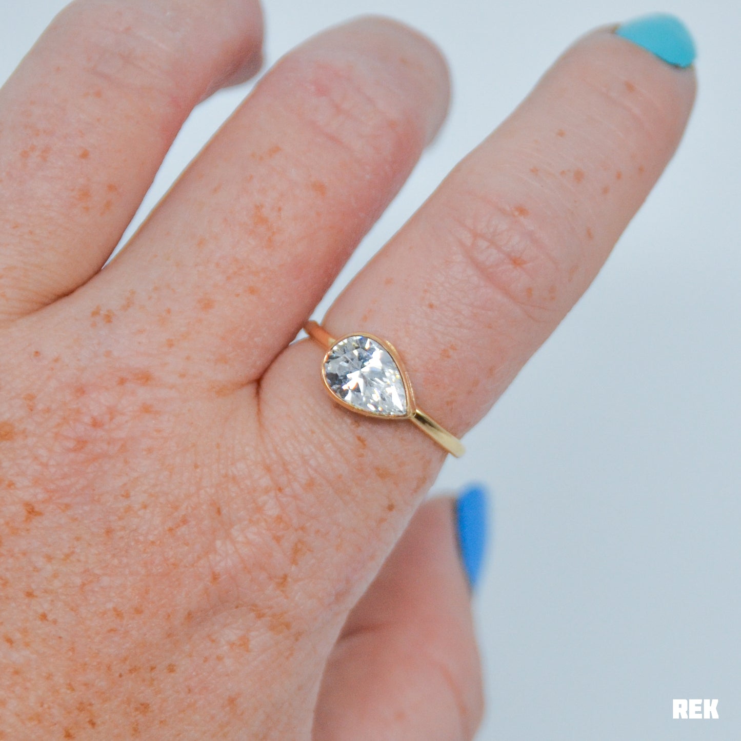Gold fill horizontal faceted CZ pear size 8