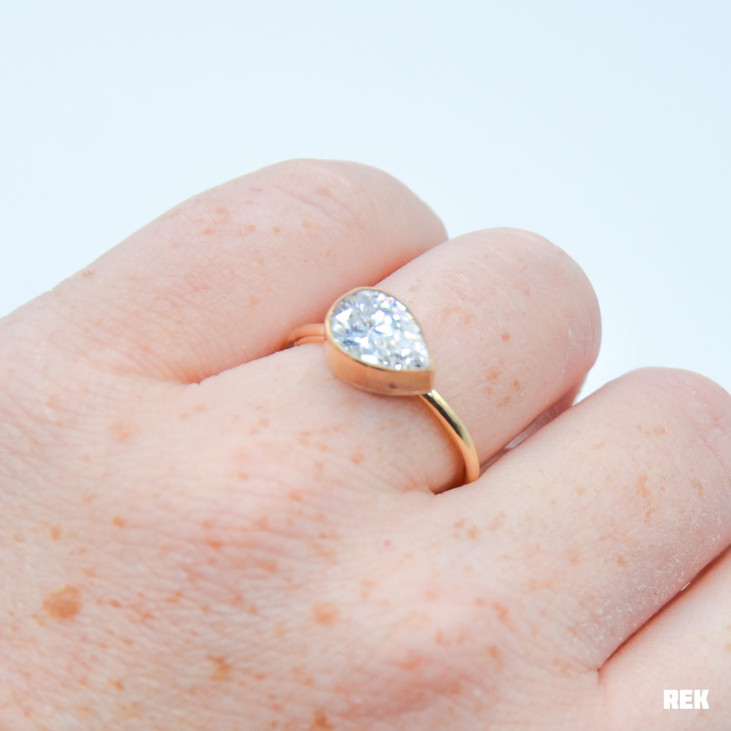 Gold fill horizontal faceted CZ pear size 8