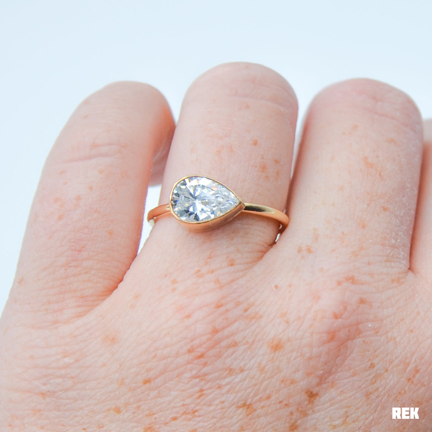 Gold fill horizontal faceted CZ pear size 8