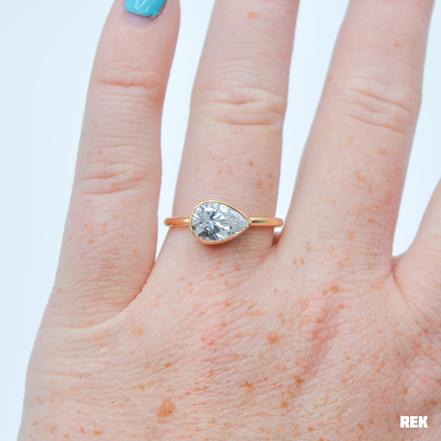 Gold fill horizontal faceted CZ pear size 8