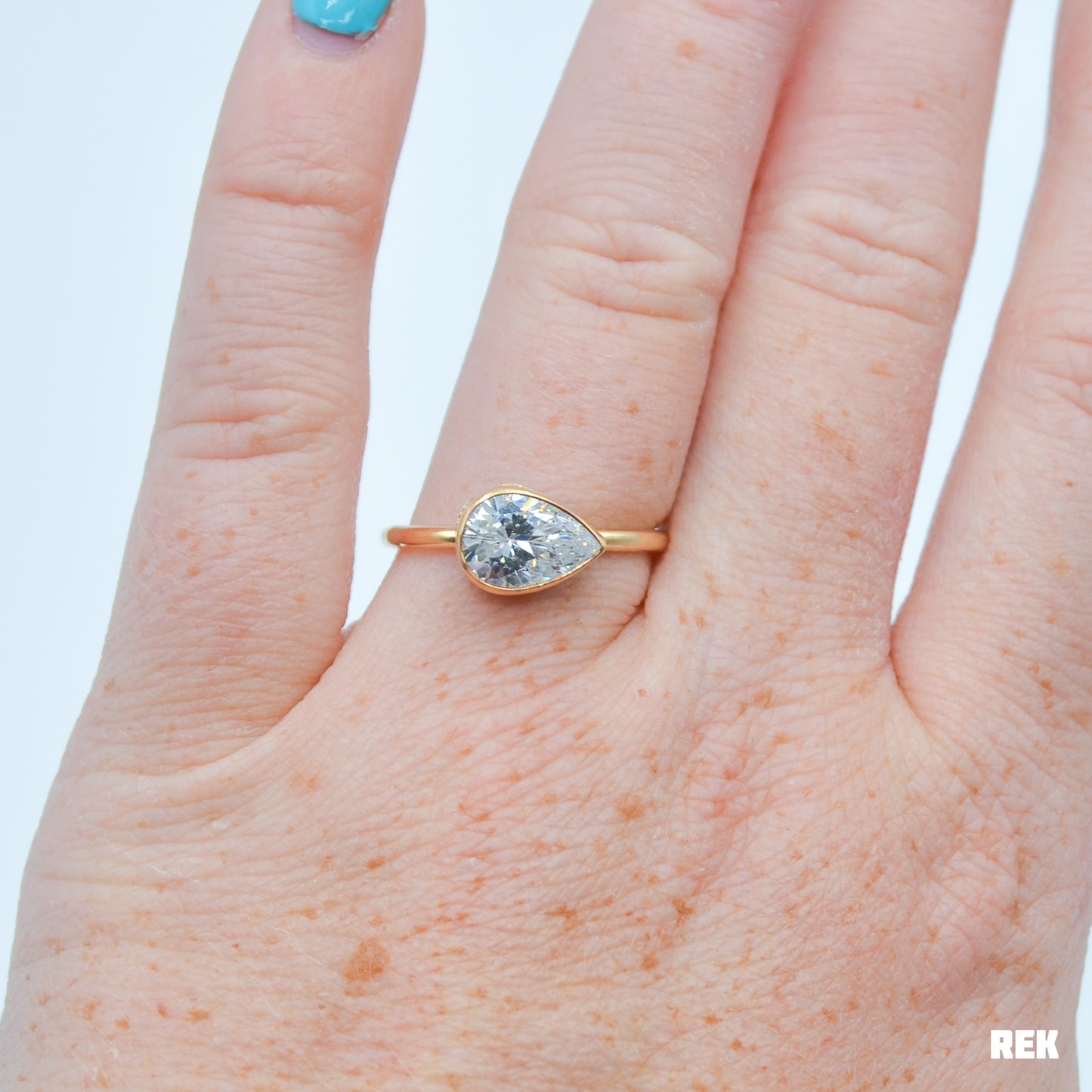 Gold fill horizontal faceted CZ pear size 8
