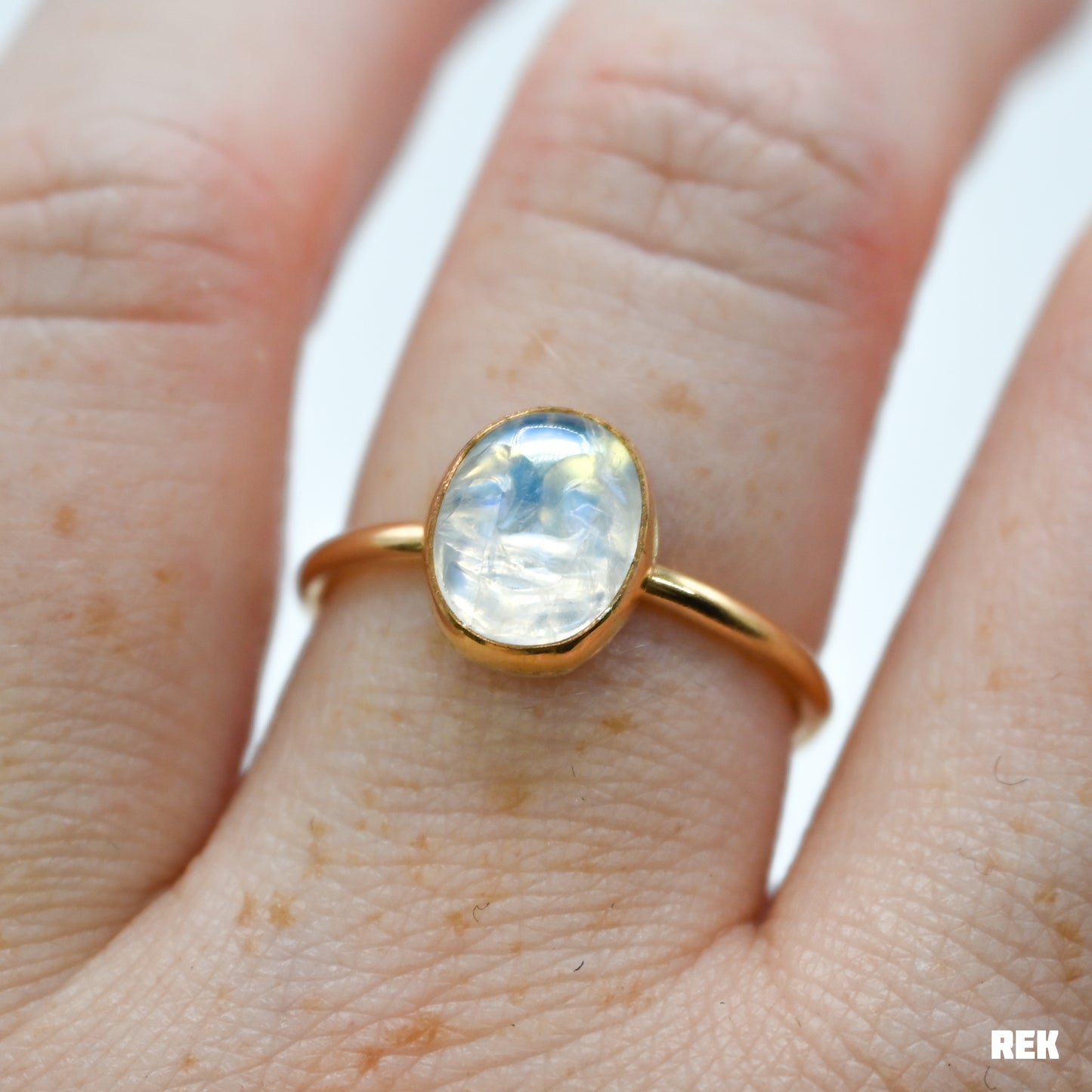 Gold fill rainbow moonstone carved face size 8.5