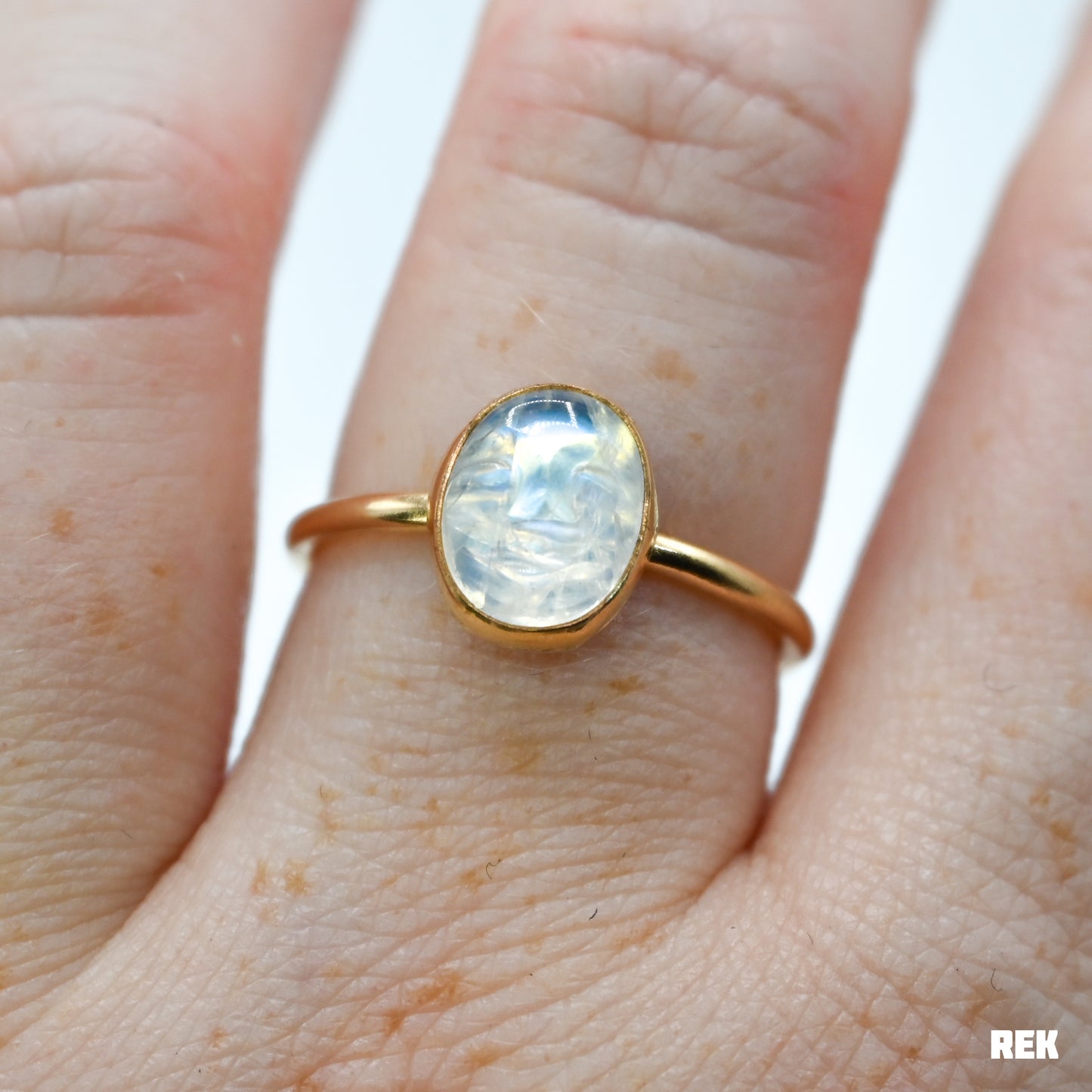 Gold fill rainbow moonstone carved face size 8.5