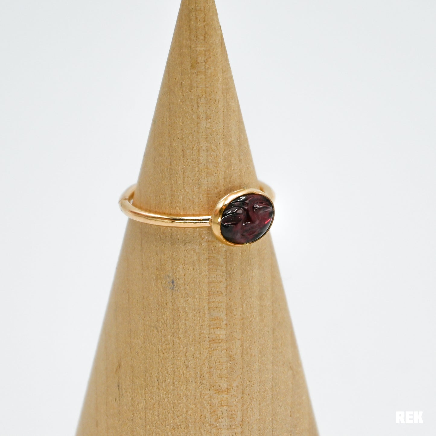 Gold fill garnet face size 7.5