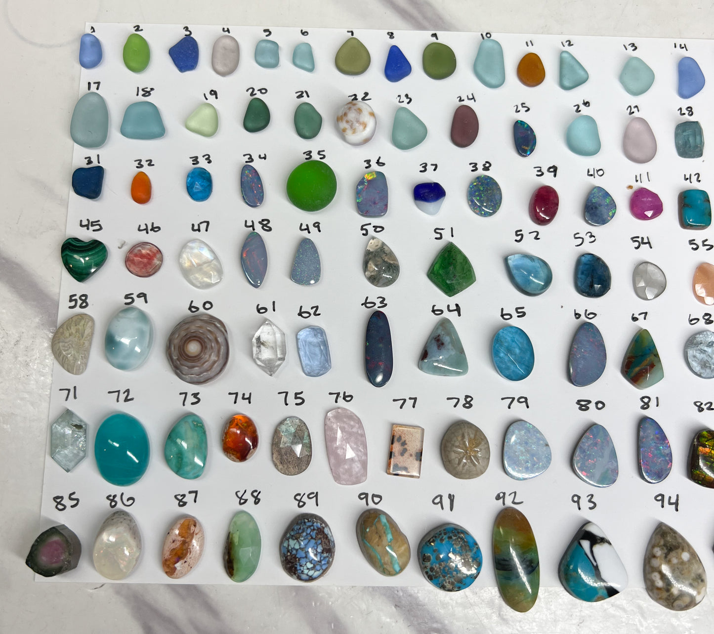 Custom gold and silver gem and sea glass rings!