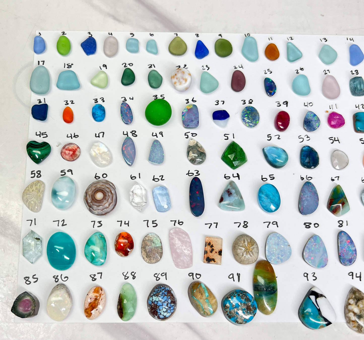 Custom gold and silver gem and sea glass rings!