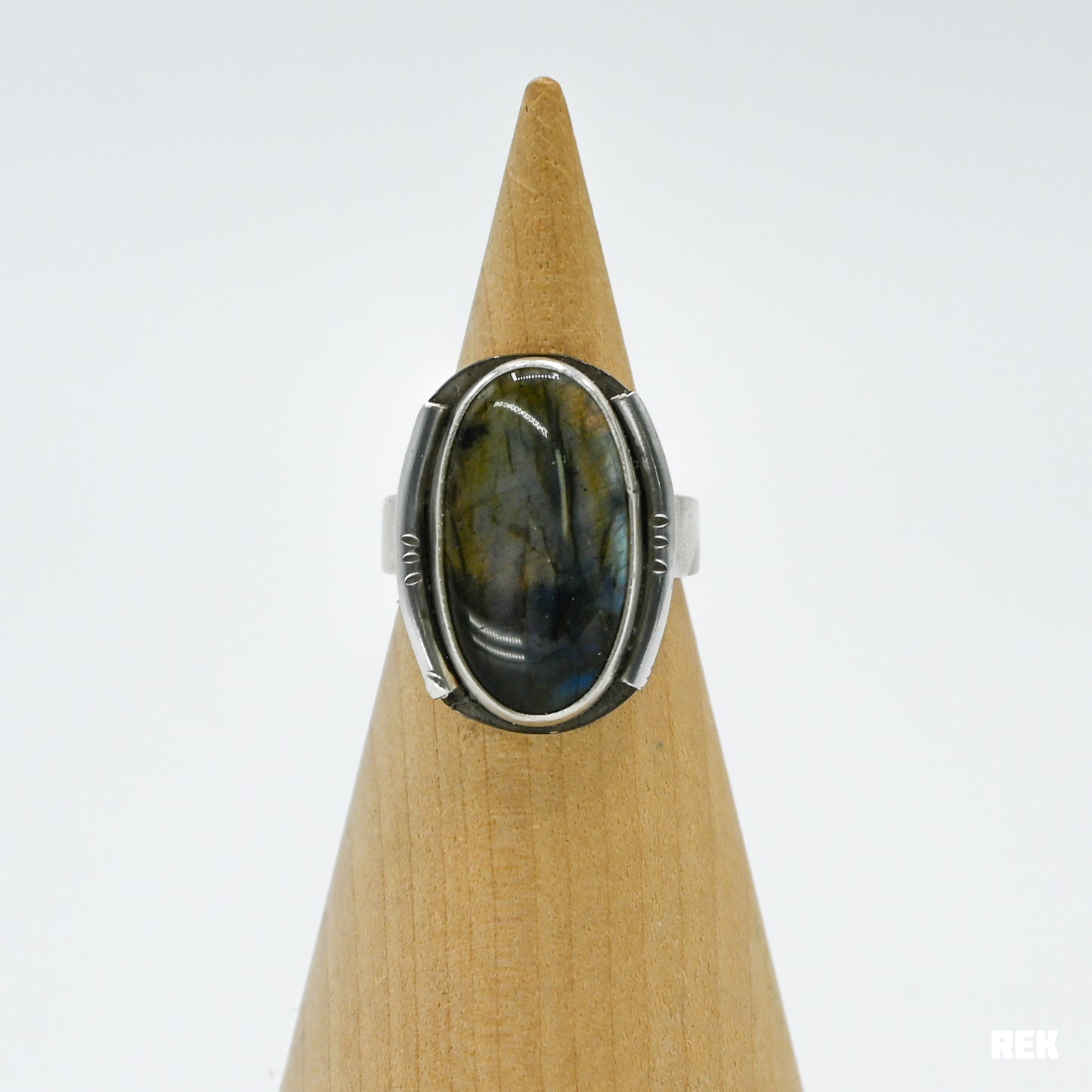 Oval labradorite with silver ornaments size 6.75