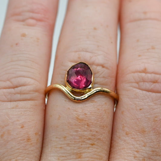 Gold fill garnet in curve band size 7