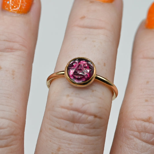 Gold fill garnet carved face size 7