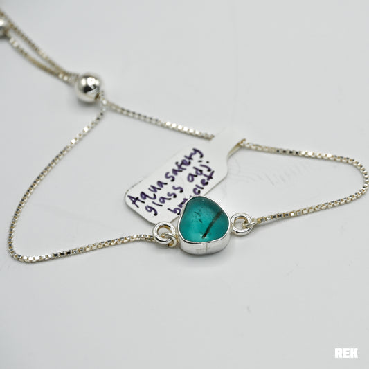 Adjustable bracelet with bright aqua safety sea glass