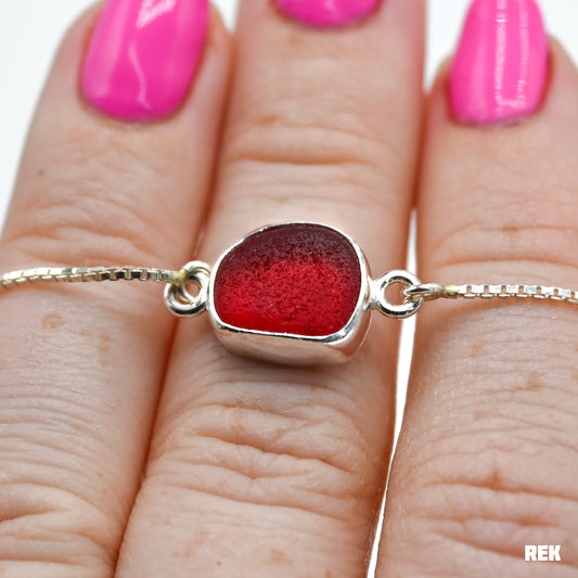 Adjustable bracelet with chunky red sea glass