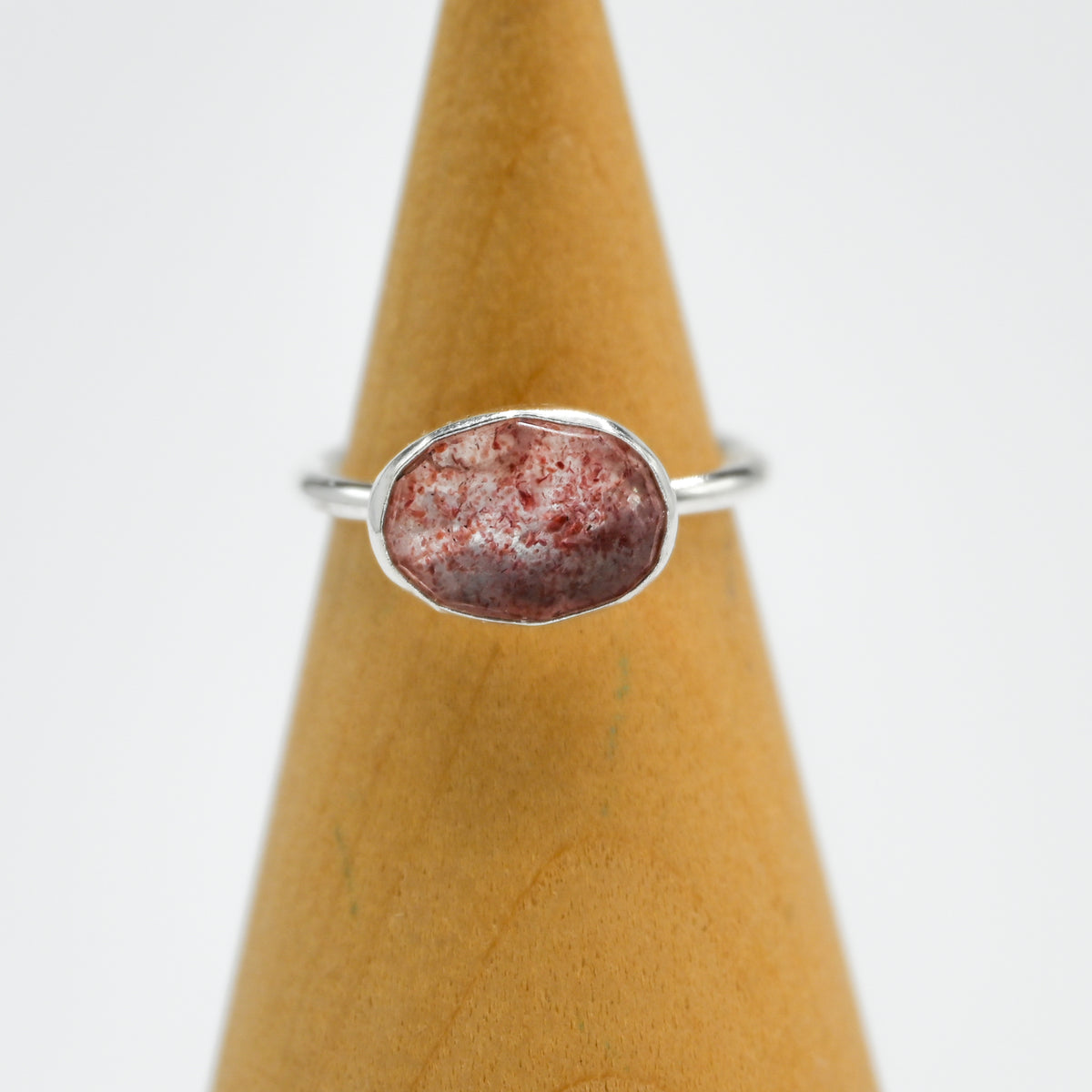 Horizontal rose cut strawberry quartz size 6.5