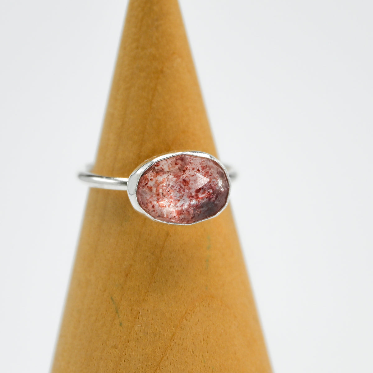 Horizontal rose cut strawberry quartz size 6.5