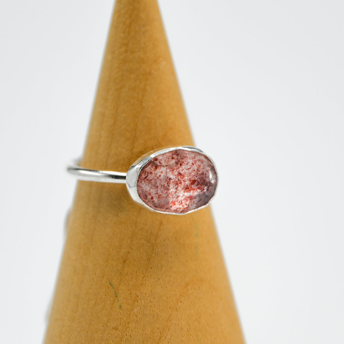 Horizontal rose cut strawberry quartz size 6.5