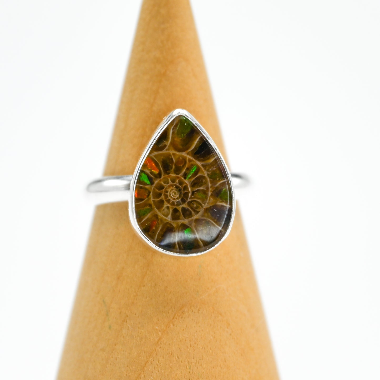 Pear ammonite with ammonite inlay size 7.25