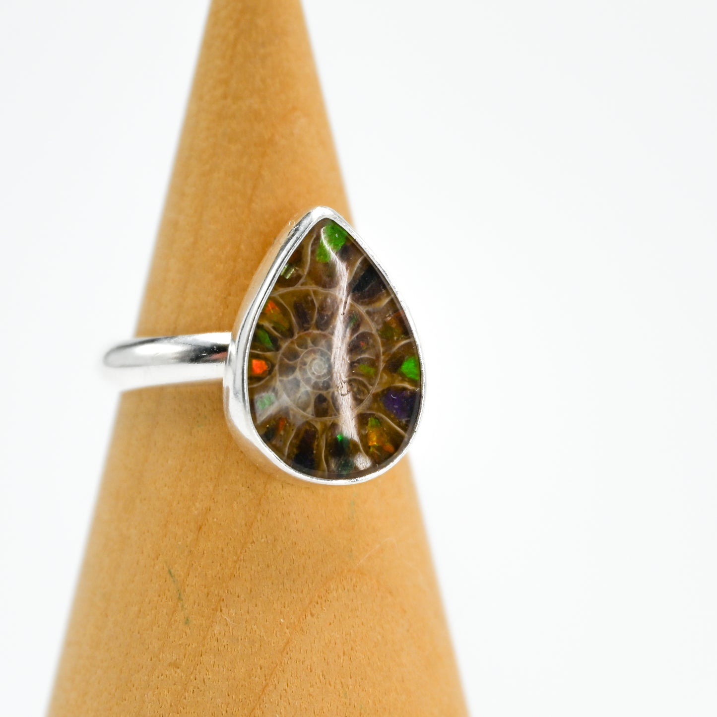 Pear ammonite with ammonite inlay size 7.25