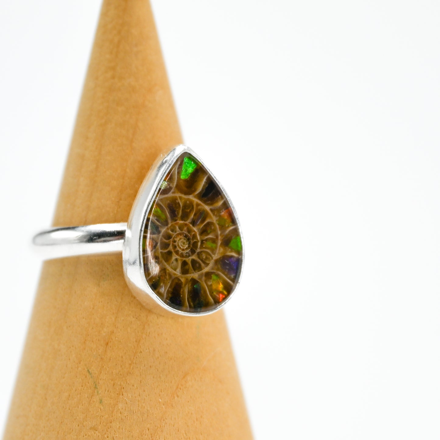 Pear ammonite with ammonite inlay size 7.25