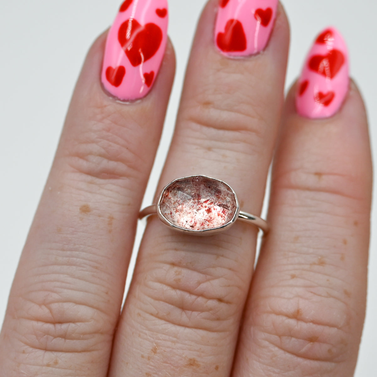 Horizontal rose cut strawberry quartz size 6.5