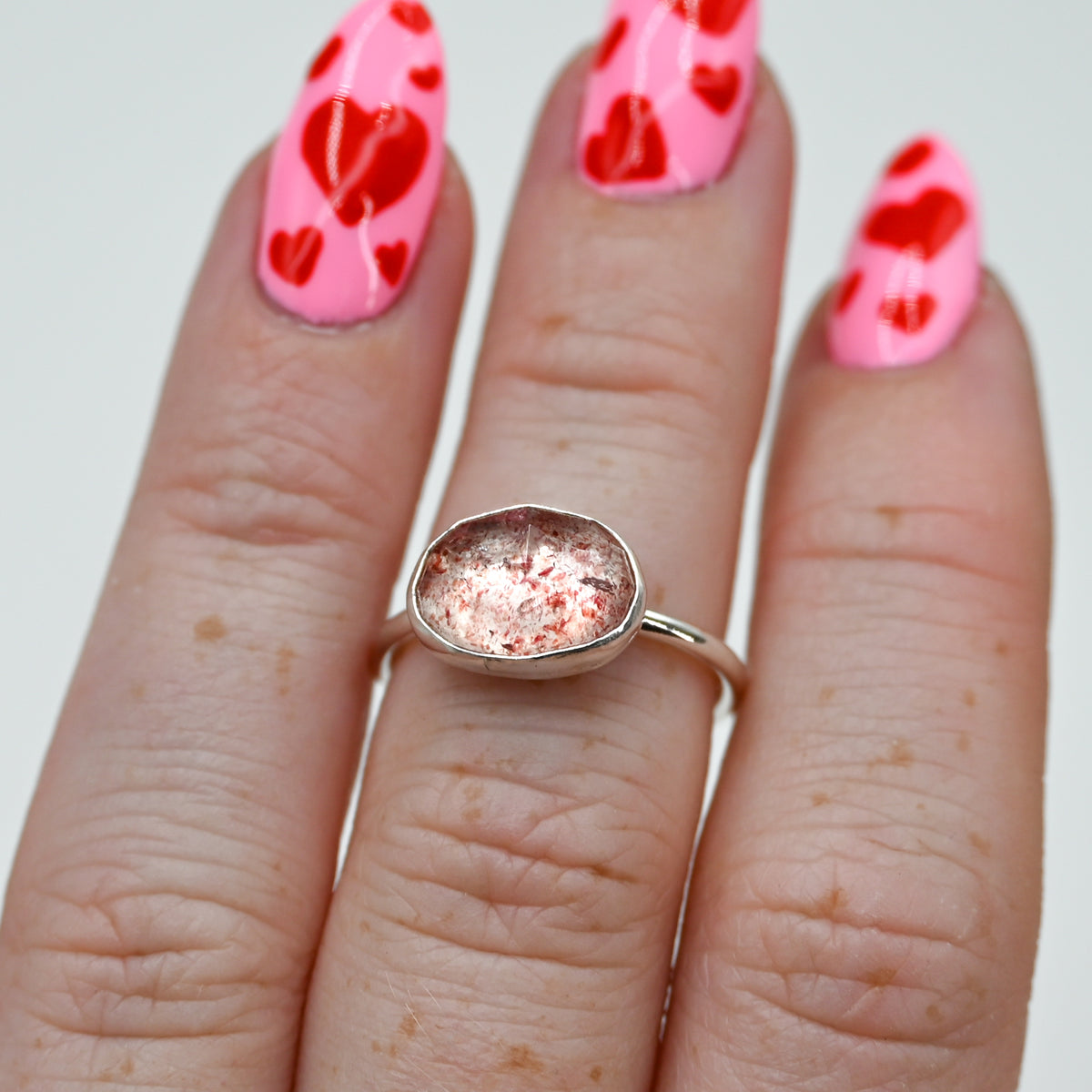 Horizontal rose cut strawberry quartz size 6.5