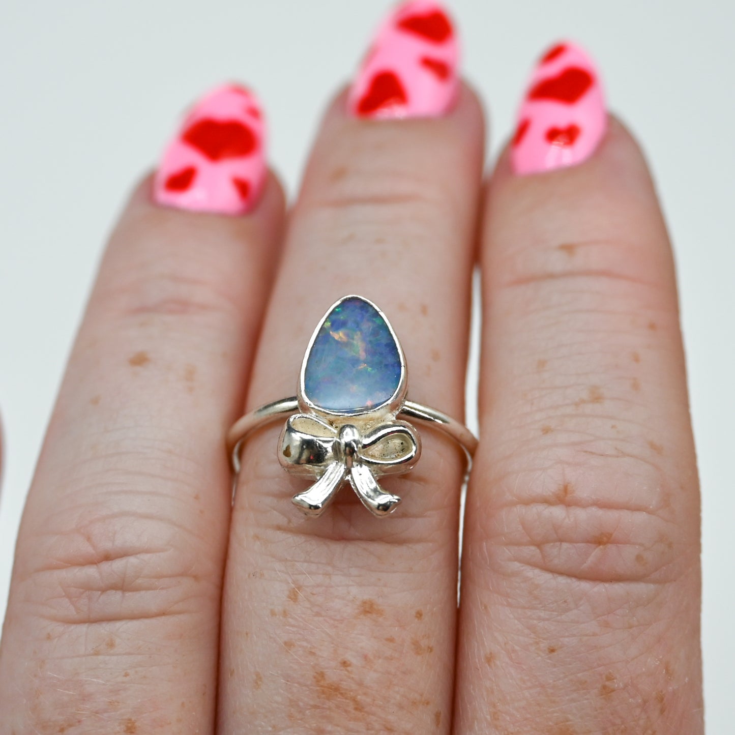 Australian opal and bow size 7