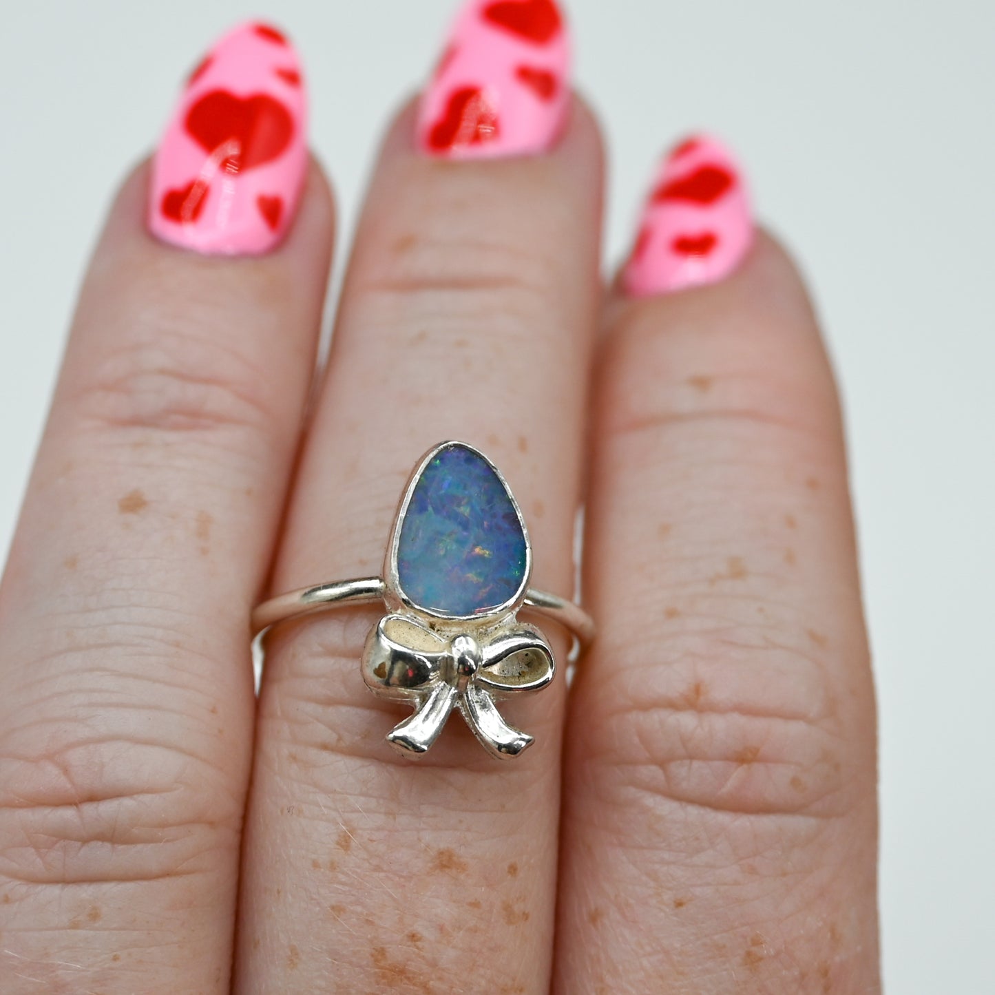 Australian opal and bow size 7