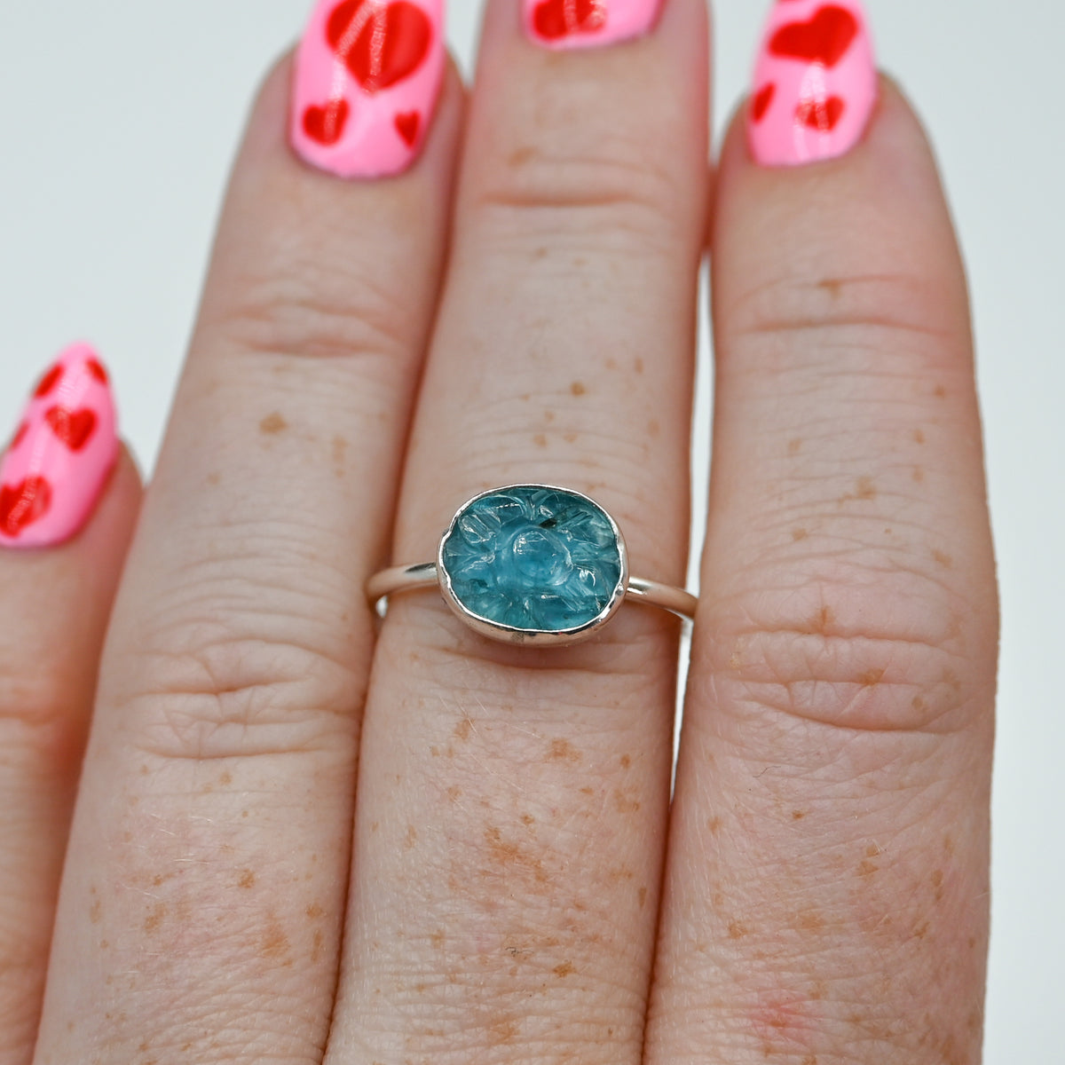 Horizontal carved teal kyanite size 7.5